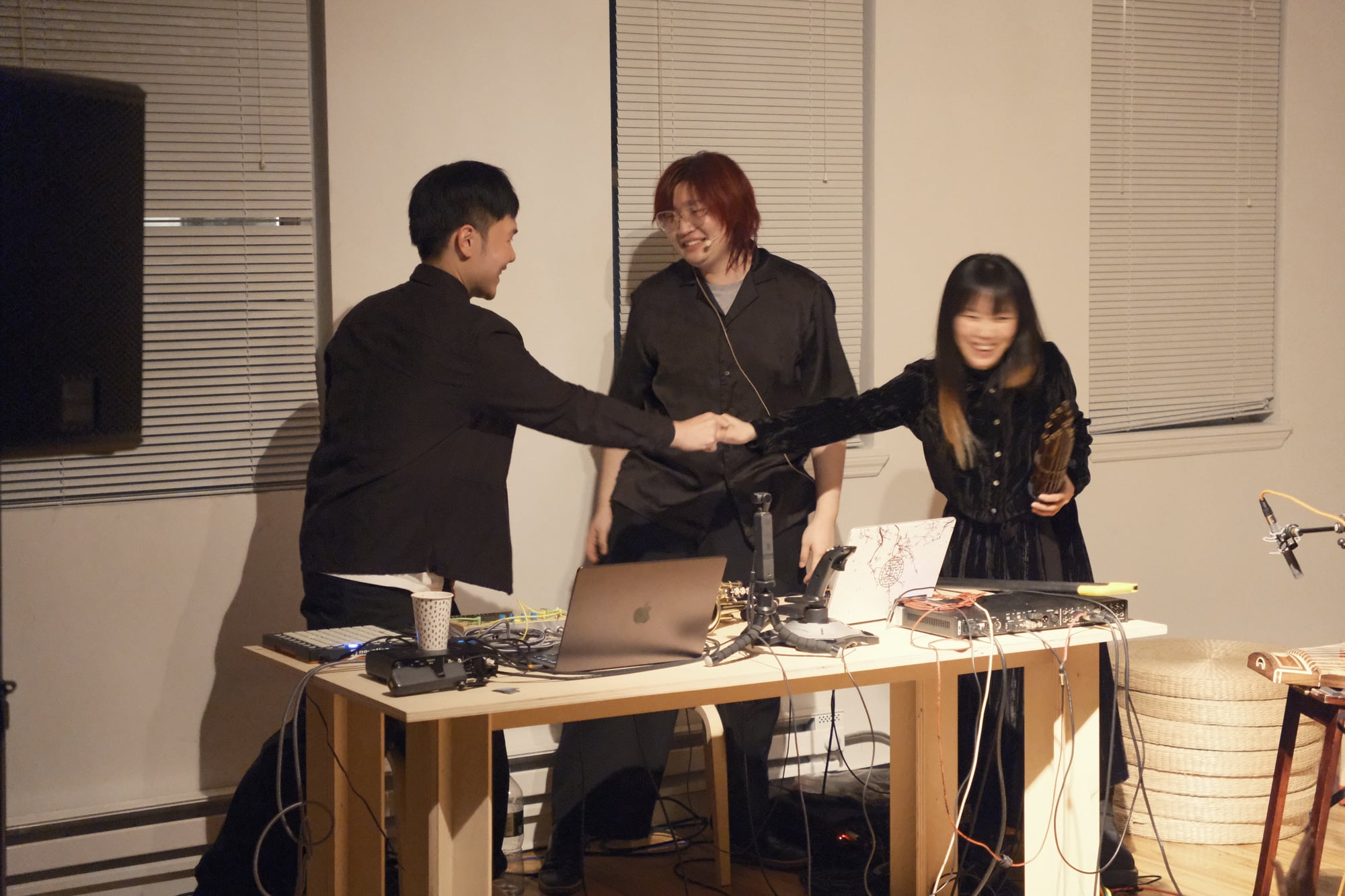 Qiujiang Levi Lu, Tianyu Zou and Chen Shuhe Yue at the mixing desk